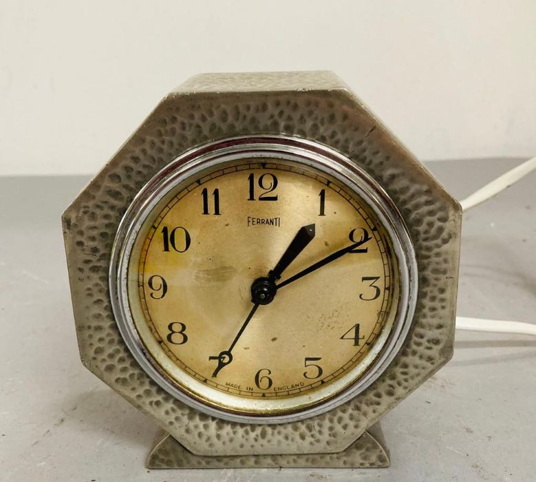 A pewter Ferrant clock