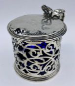 A silver pierced mustard with blue glass liner. H A & Sons, hallmarked for London 1872.