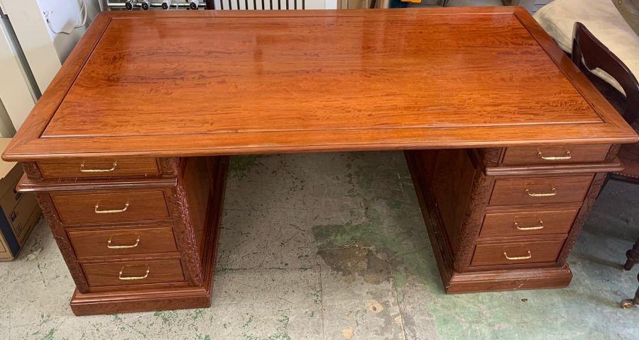 A rosewood pedestal desk with carving to door sides and turned metal handles (186cm x 90 cm x 78 - Image 6 of 7