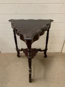 A mahogany two tier table of tripod shape (H69CM)