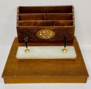 A carved wooden desk tidy along with a wooden writing slope and pen holder