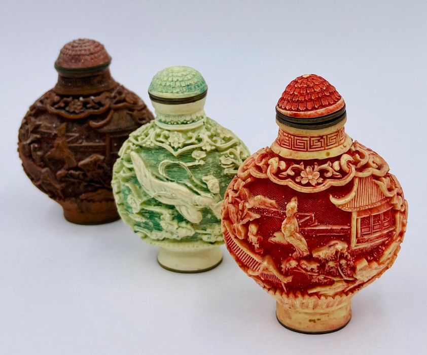 A collection of Chinese scent bottles in a wooden wall hanging display case. - Image 2 of 7