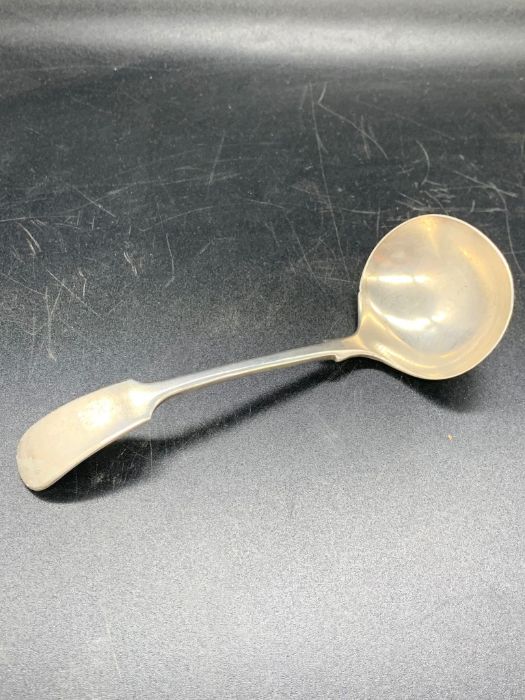 A 1902 Sheffield hallmark ladle.