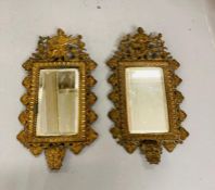 A pair of ornate metal , bevel edged mirrors 37cm H x 20 cm W