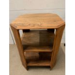 An oak three tier side table (H59cm W46cm)