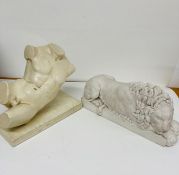 Two plaster sculptures of a Lion and a Torso