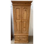 A pine slim single wardrobe with two drawers under (H200cm W70cm D54cm)