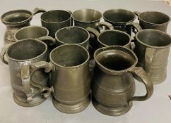 Thirteen one pint pewter vessels to include tankers, cider cup various markers marks
