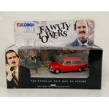 A Corgi 00802 Fawlty Towers Austin 1300 Estate diecast model with Basil Fawlty figure