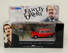 A Corgi 00802 Fawlty Towers Austin 1300 Estate diecast model with Basil Fawlty figure