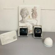 A selection of boxed Lladro to include Summer Bell, Bas Relief Porcelain Plaque, two coin purses and