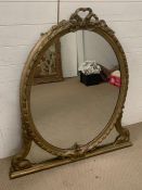 A gilt framed oval mirror (110cm x 128cm)