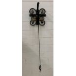 A wrought iron outside bell with pully cord (22cmsq)