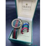 A Gucci vintage watch 1200 with International warranty card.
