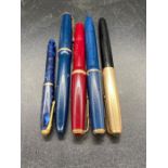 Five various pens, some Parkers