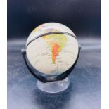 A small desk top globe