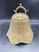 A brass gong, no frame, probably Chinese with Dragon decoration.