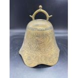 A brass gong, no frame, probably Chinese with Dragon decoration.