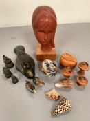 A selection of collectables turned mushrooms, sculpture of a girl, cast duck etc