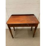 A mahogany wash stand on turn legs and drawers to centre AF (H79cm W90cm D49cm)Condition Report Chip