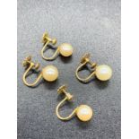 Two pairs of 9ct gold pearl earrings