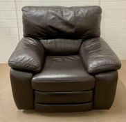 A brown leather reclining arm chair (H98cm W110cm D100cm)