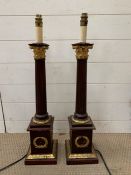 A pair of Corinthian column lamps