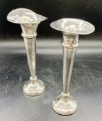 A pair of silver vases AF by L & S, hallmarked for Birmingham 1928