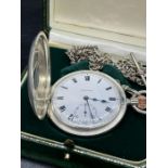 A Silver Longines Half Hunter Pocket watch, circa 1926 with enamel dial and silver double Albert