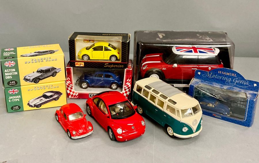 A number of diecast vehicles, various makers and models.