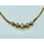 A Five stone diamond necklace on an 18ct gold chain (Approx weight of chain excluding pendant 5g)