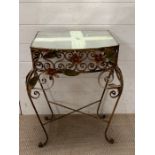 A wrought iron table with mirrored top (H70cm W54cm D32cm)