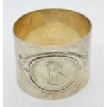 A Continental silver napkin ring, marked 800.