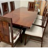 A dining table with six chairs and two carvers made in Italy with one leaf (H78cm W196cm D107cm Leaf