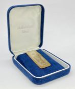 A hallmarked and boxed silver money clip for 2000.