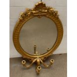 A giltwood wall mirror with overlapping leaves to frame and three arm branches (H100cm W58cm)