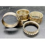 Four silver napkin rings