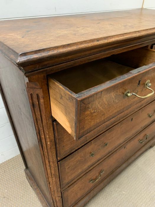 A George III style chest of drawers with brass handles and bracket feet (H123cm W107cm D44cm) - Image 2 of 9