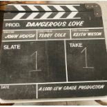 A 'Dangerous Love' movie clapperboard from the estate of Keith Wilson Production Designer and Art