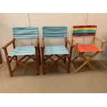 Three folding beach chairs