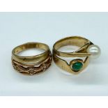 A selection of four 9ct gold rings in various settings and styles (Total Weight 9g)