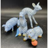 A group of four Herend porcelain figures in blue fishnet pattern to include Otter, Pig, Fawn and a