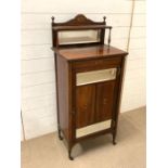 A mahogany music cabinet with mirror glass (H124cm W53cm D38cm)
