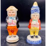 Staffordshire salt and pepper pots in the figure of men.