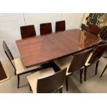 A hi-gloss contemporary dining table and eight chairs by ALF group with one centre leaf
