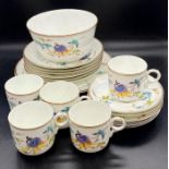 A selection of stamped bone china, a part tea service with floral decoration