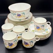 A selection of stamped bone china, a part tea service with floral decoration