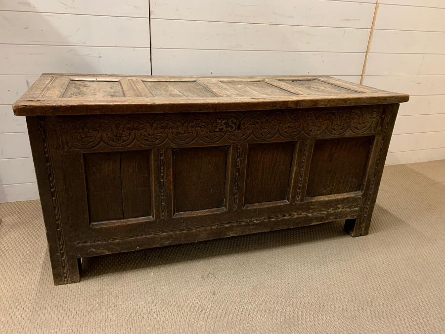 A 17th Century four panelled Coffer with hinged lid raised on bracket feet 135 L x 58 D x 63H - Image 2 of 8