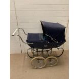 A children silver cross pram