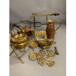 A selection of cooper and brass items